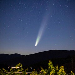 Comet over mountains at night (1)