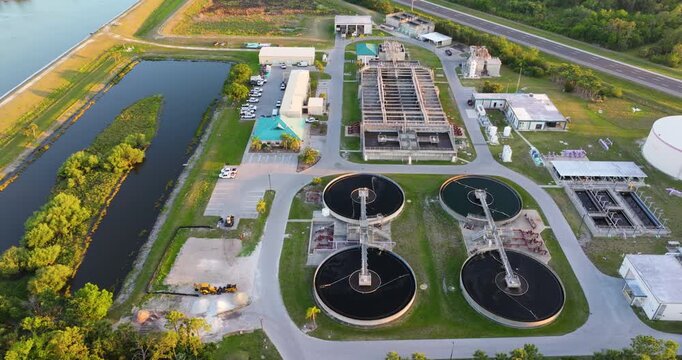Industrial water treatment facility with water cleaning cisterns and piping system.