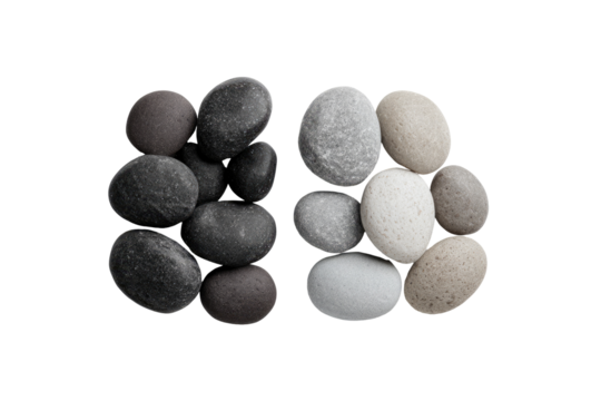 Two stacks of smooth, various-toned stones, forming an abstract shape against a black background. The stones are dark grey, light grey, and beige
