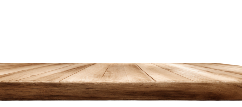 Close-up of a light brown wooden table top against a dark background