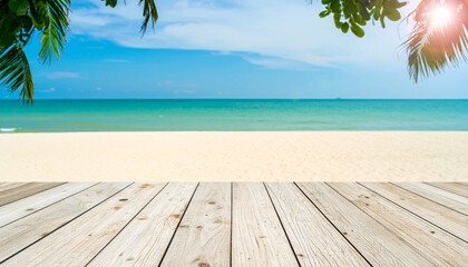 Empty wooden table on a beautiful tropical beach with a wooden floor under the summer sun, overlooking the blue sea and sky horizon