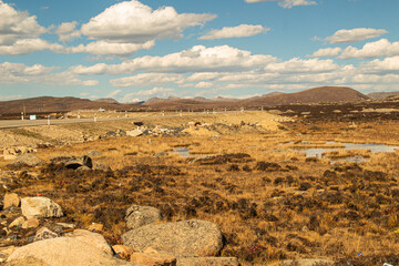 Haizi Mountain, Sichuan Vast plateau strewn with rocks under a blue sky
