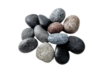 Assorted smooth stones arranged in a rosette pattern.?Various shades of grey, black, and brown.?Flat lay, isolated against black background