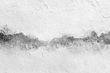 Gray-white wall with dark horizontal stain