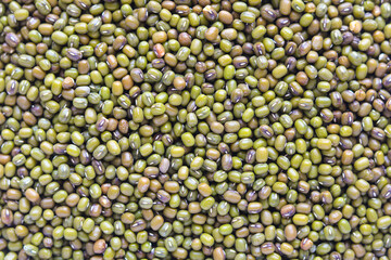 A full frame, closeup shot of green mung beans. A nutritious ingredient for cooking.