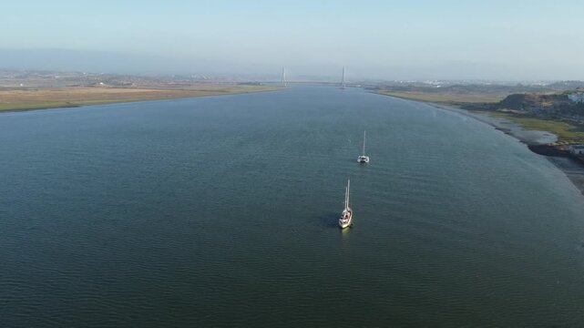 Aerial view of Rio Guadiana, that is the border between Spain and Portugal, with the bridge puente internacional del Guadiana, that connects the two countries