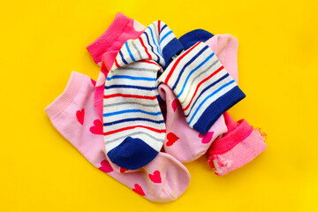 Colorful socks with heart and stripe patterns