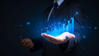 A man in a suit has one hand outstretched against a dark background, with a glowing, rising blue line chart on his hand