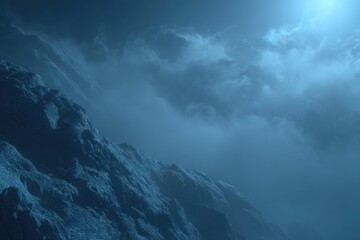 Misty mountain range under a cloudy moonlit sky