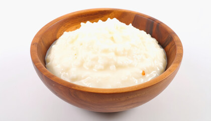 Bowl of creamy rice milk yogurt isolated on a bright white background perfect for healthy eating and culinary presentation