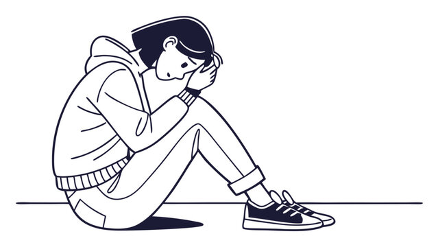 Sad young person sitting alone feeling depressed.