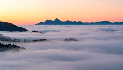 Obraz premium Misty mountain panorama at sunrise