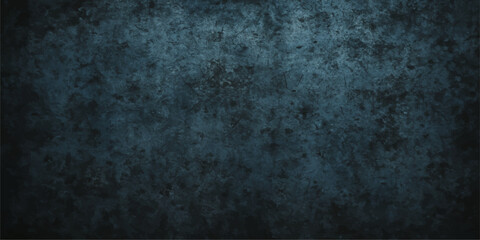 Dark vintage blue textured concrete wall with a blank, rough surface