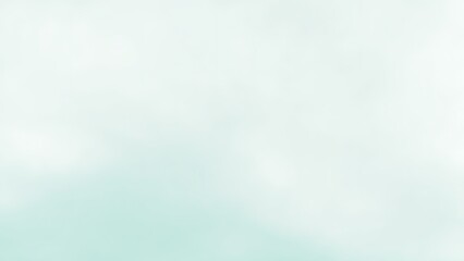淡いミントグリーンのぼかしと光の抽象背景