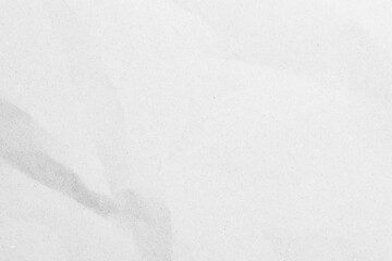 White recycled craft paper texture as background. Grey paper texture, Old vintage page or grunge vignette of old newspaper. Pattern rough art creased grunge letter. Hardboard with copy space for text.