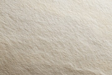 Close-up view of a light beige textured surface