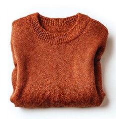 Folded, terracotta-colored sweater