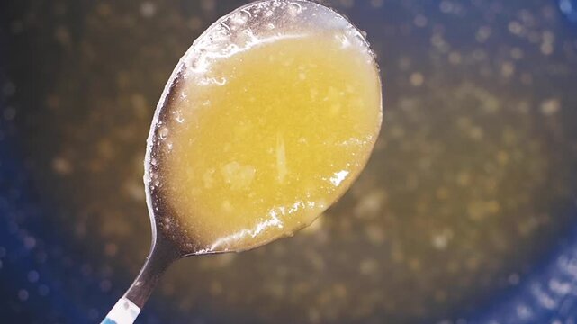 top view of spoon pick ghee