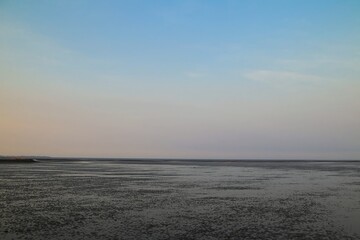Beautiful and calm beach view with blue sky