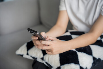 Asian woman using smartphone texting message browsing information