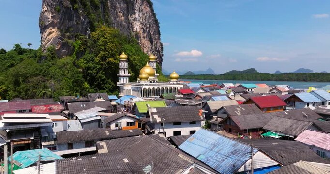 Floating Village Settlements And Darussalam Mosque In Ko Panyi, Thailand. Aerial Drone Shot