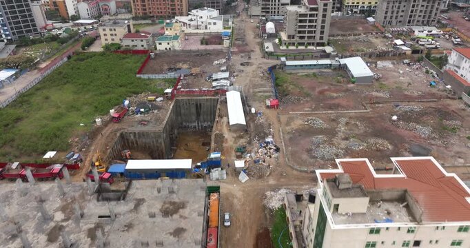 Building Construction Site On The City Of Bole Area In Addis Ababa District In Ethiopia. Aerial Tilt-up Shot