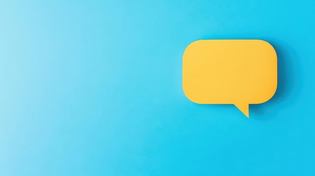 Minimalist yellow speech bubble on bright blue background symbolizing communication conversation dialogue or messaging in a modern digital context
