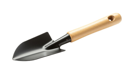 Fototapeta premium Close up of a garden trowel with a wooden handle ready for planting in a garden setting