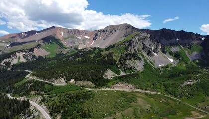 Fototapeta premium Mountainous landscape with winding road