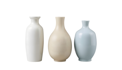 Three minimalist ceramic vases on a transparent background