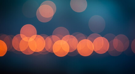 Abstract Bokeh Lights Background in Warm Orange and Teal