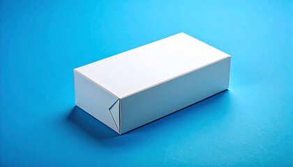 A close-up shot of a plain white rectangular box on a vibrant blue surface.