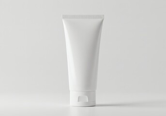 Clean white cosmetic tube mockup for cream or lotion, standing on a simple white background for product packaging design and branding.
