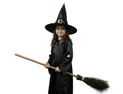 Young witch holding broom posing for Halloween