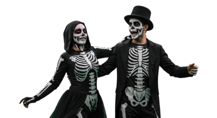 Man and woman dressed as skeletons for Halloween