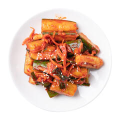 Top view of Korean kimchi cucumber on white plate, Korean side dish, Homemade food	