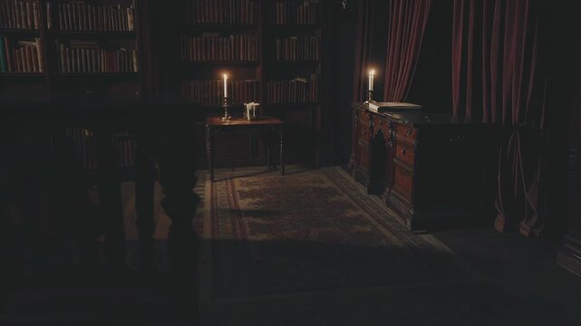 Dimly lit vintage library with candles casting soft light on bookshelves. Captured from a low angle, creating a mysterious video ambiance. Live desktop wallpaper.