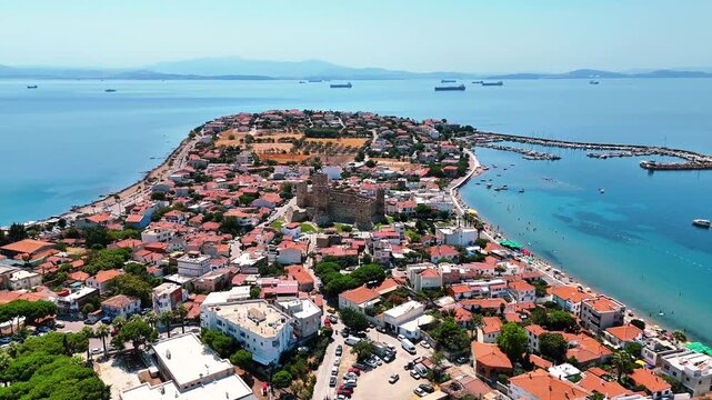 4k drone video of Dikili's magnificent town Candarli With castle and fascinating peninsula view. Izmir in Turkiye.