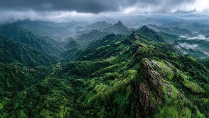 Fototapeta premium Lush mountain range, dramatic clouds