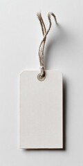 Blank white tag with beige string