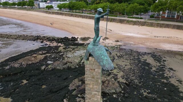 Drone orbit around the seaside American monument bronze statue aka Le Sammy, Saint-Nazaire, Loire-Atlantique, France.