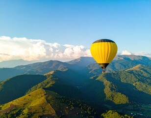 Naklejka premium Yellow Hot Air Balloon Over Green Mountain Landscape