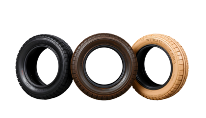 Three Car Tires Black Brown and Tan Displayed