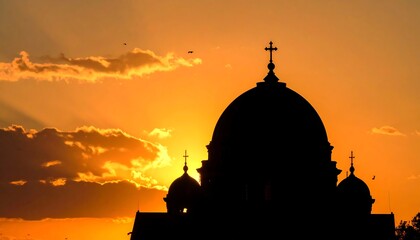 Silhouette of church at sunset