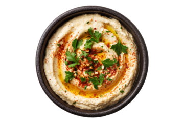Mutabbal creamy baba ganoush roasted eggplant puree with tahini and lemon served in wooden bowl, garnished with parsley and olive oil, isolated on white transparent background, concept of healthy food
