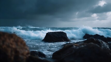 Dramatic storm waves crashing against rugged rocks