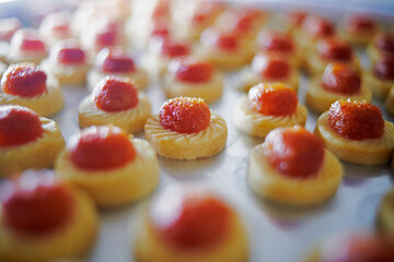 Freshly baked pineapple tarts on an oven tray