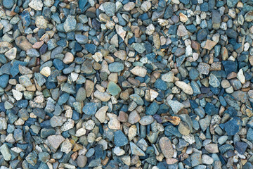 Small pebbles stones texture background top view