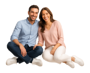 Happy couple smiling, dressed casually, enjoying a joyful moment together.