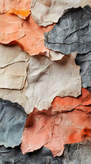 Textured collage of crumpled and torn handmade paper in earthy tones creating an abstract background.